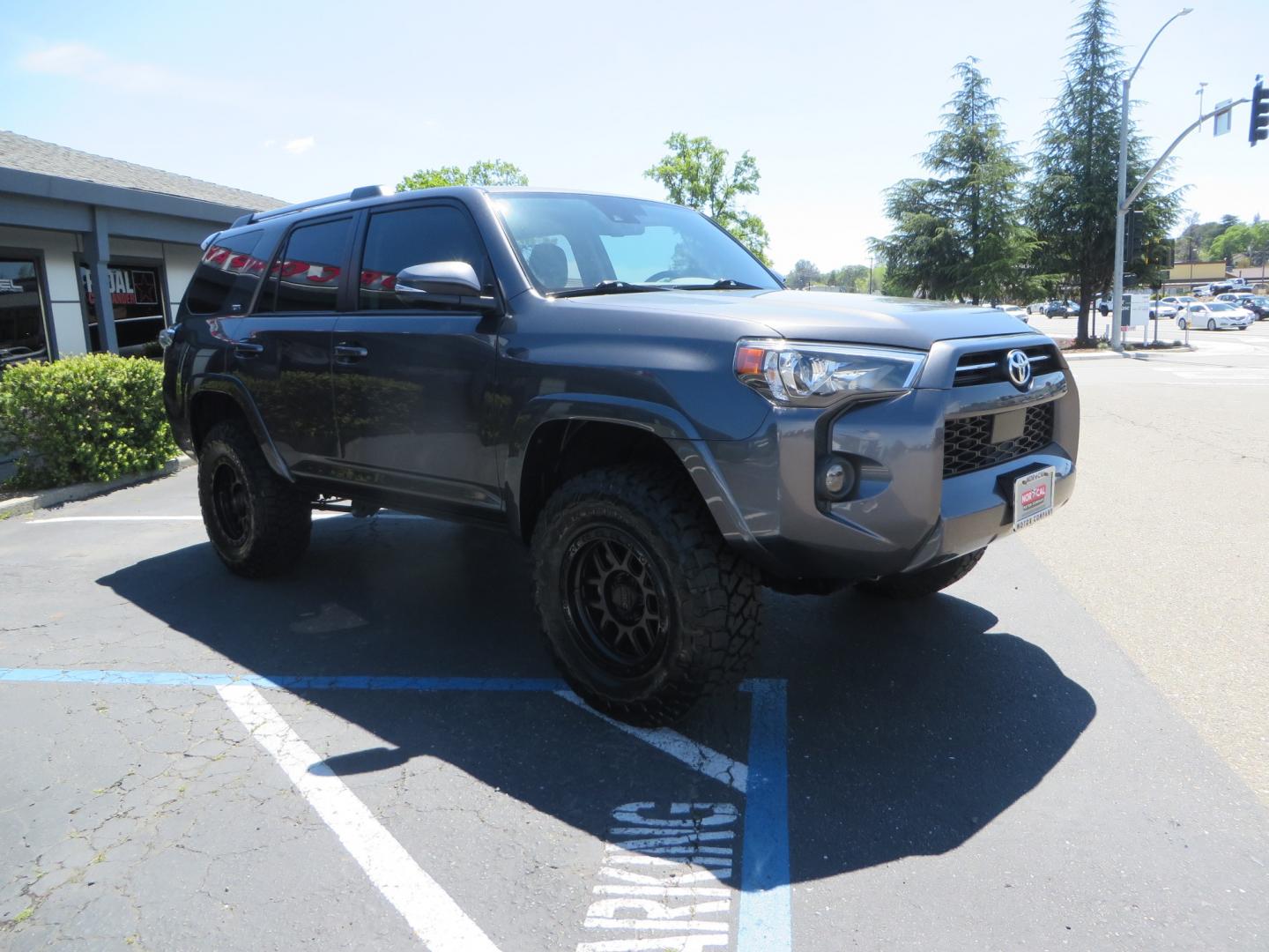 2021 CHARCOAL /BLACK Toyota 4Runner SR5 Premium 4WD (JTENU5JR0M5) with an 4.0L V6 DOHC 24V engine, 5A transmission, located at 2630 Grass Valley Highway, Auburn, CA, 95603, (530) 508-5100, 38.937893, -121.095482 - Clean SR5 Premium 7 passenger with a set of Bilstein 5100 series front struts and rear shocks, Bilstein 1" rear springs, 17" KMC 544 wheels, and Toyo RT Trail tires. - Photo#2